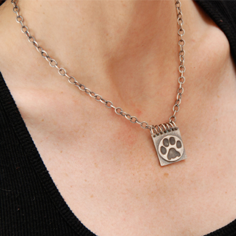 Spiral Paw Locket